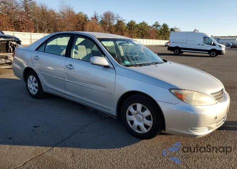 2003 Toyota Camry Le z USA, uszkodzony, nr VIN 4T1BE32KX3U695963